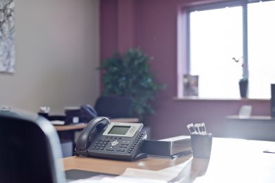 close up of desk phone at manchester east serviced office