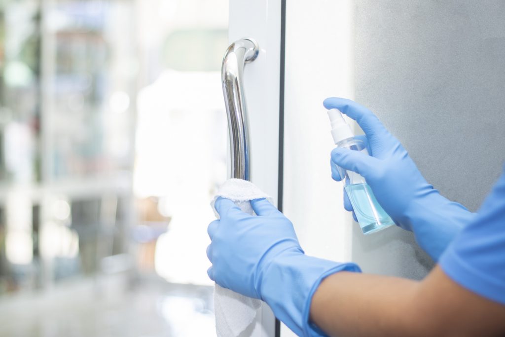 disinfecting door because of virus